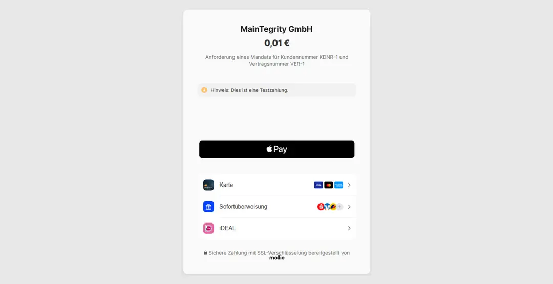 Bezahlseite von Mollie im Testmodus: MainTegrity GmbH, 0,01 €, Anforderung eines Mandats, Hinweis „Dies ist eine Testzahlung“, Zahlungsarten Apple Pay, Karte, Sofortüberweisung und iDEAL